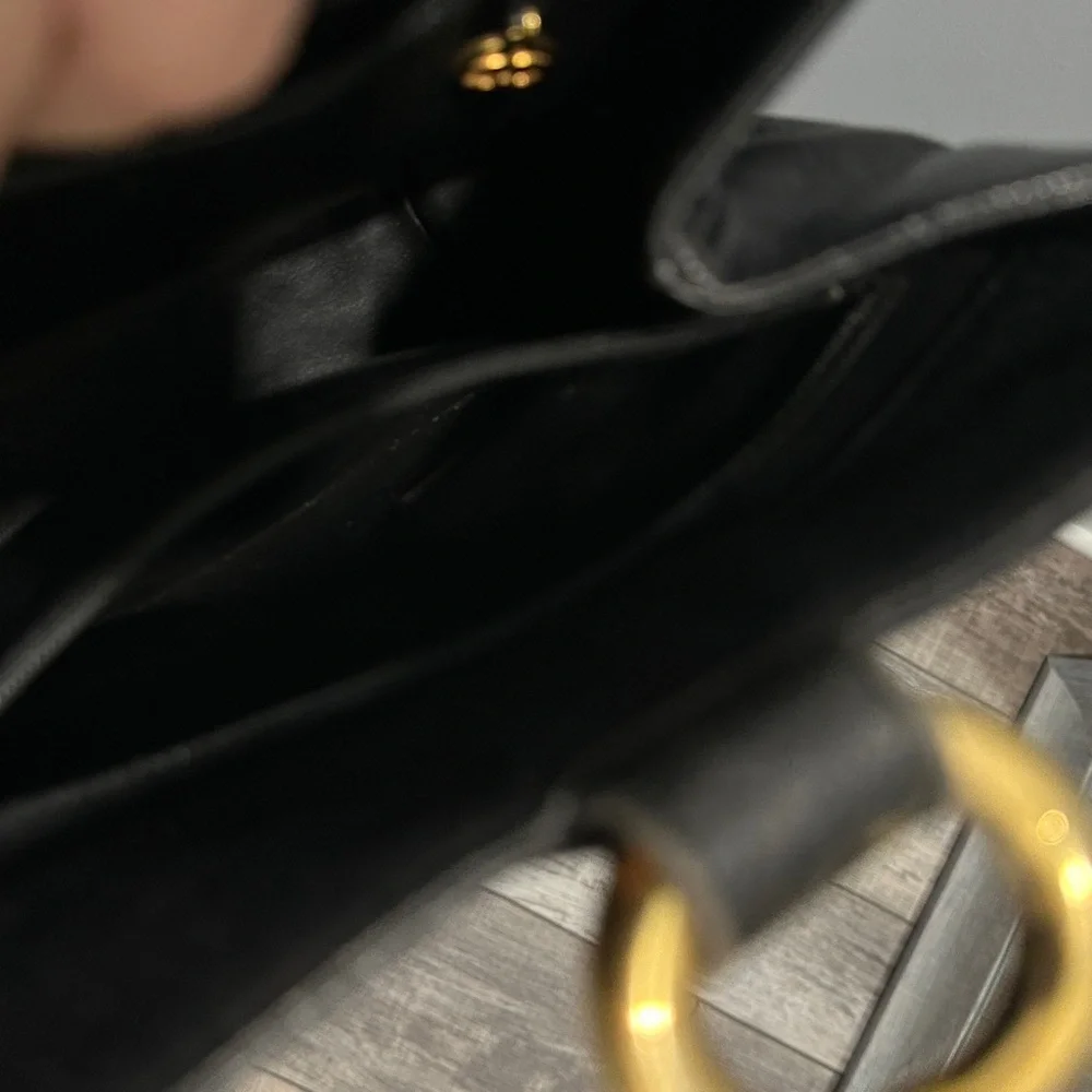 CHANEL Black Leather Bucket Bag with Gold Accents - Picture 8 of 8